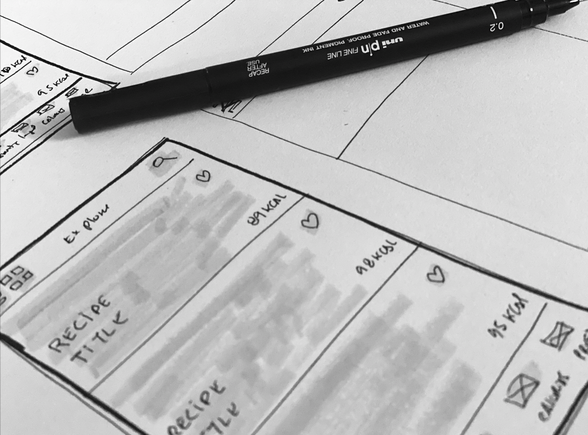 Hand-sketched low-fidelity wireframes